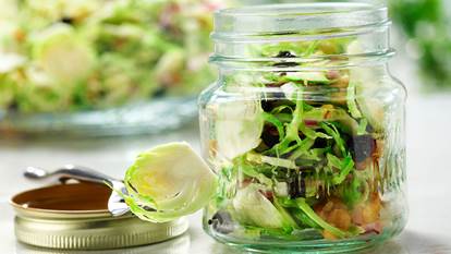 Brussels sprout blueberry and walnut slaw in a mason jar