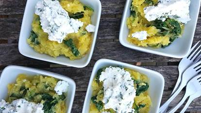 Bowls of pureed squash, spinach topped with ricotta cheese